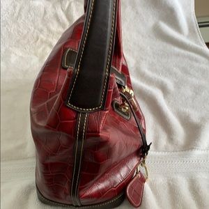 Dooney and Bourke logo lock hobo